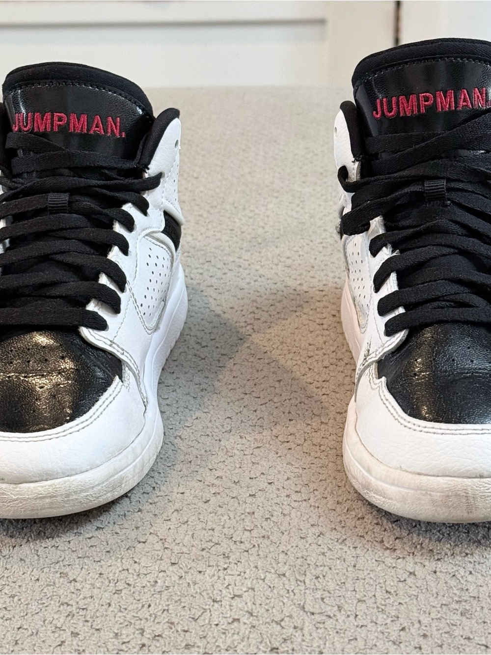 Nike White, Black & Red Jumpman High Top Sneakers